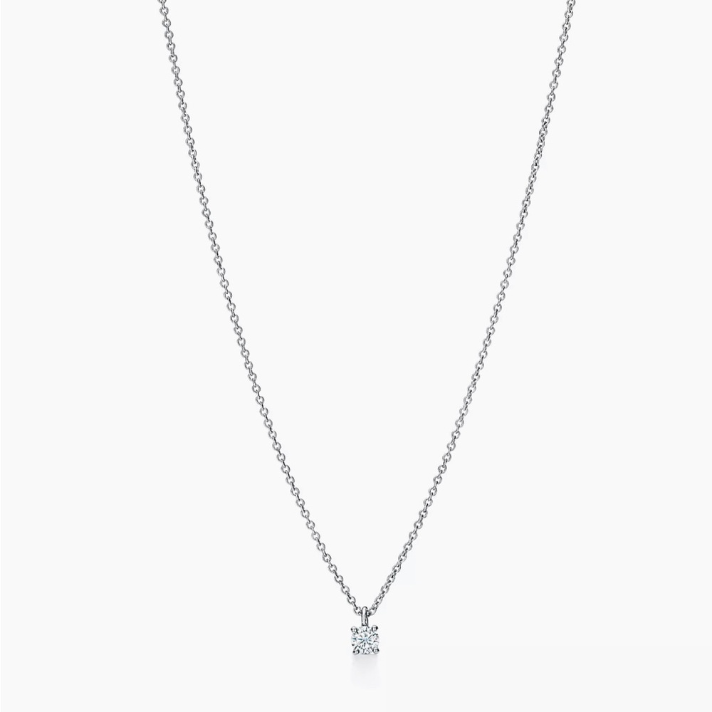 Tiffany solitaire diamond pendant in platinum .17 carat